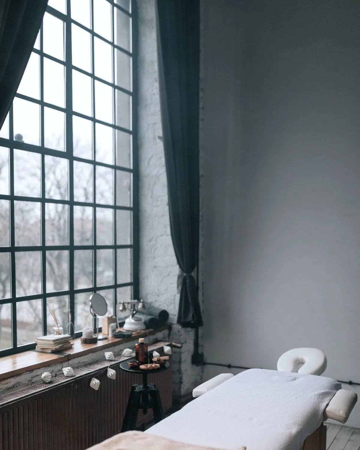 The window in the treatment room, blind half drawn.